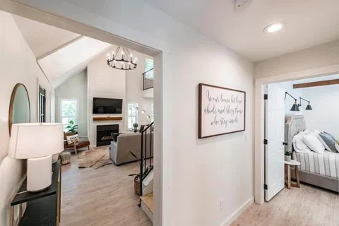 a view of living room with furniture and a flat screen tv