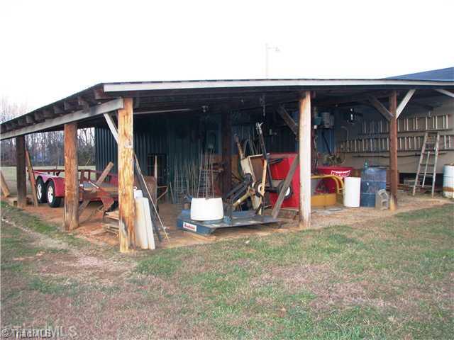 286 Crousetown Road Lexington, NC 27292 - Photo 3 of 16 Shop/Service Bay(s). The work shop offers plenty of covered space to park most all of your farm tools and toys.