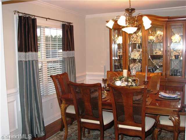 286 Crousetown Road Lexington, NC 27292 - Photo 8 of 16 Dining Room. The formal dining room offers beautiful hard wood floors and waste high picture molding surrounds the room.