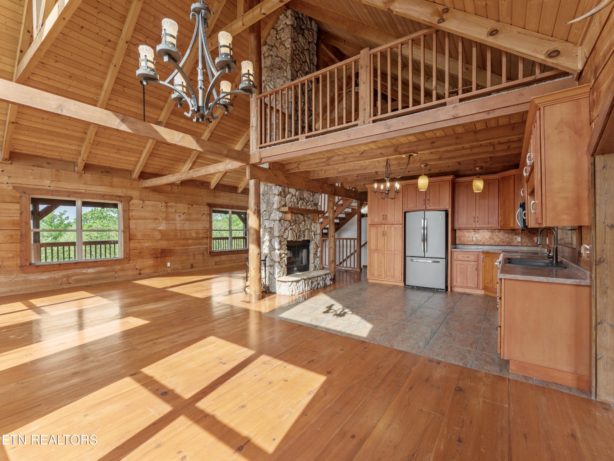 155 George Thomas Road Vonore, TN 37885 - Photo 17 of 51 a view of a porch with wooden floor and a yard
