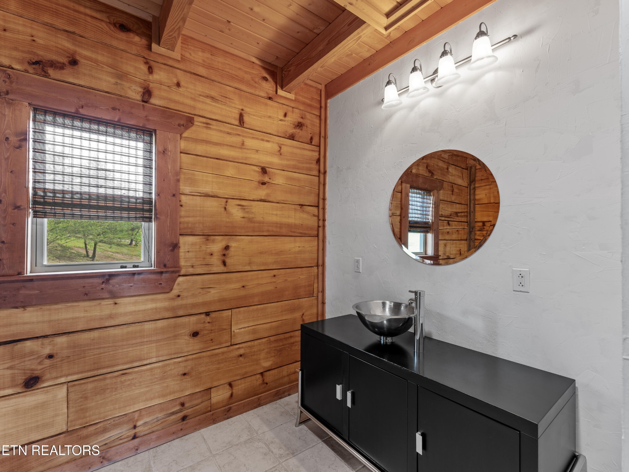 155 George Thomas Road Vonore, TN 37885 - Photo 25 of 51 a bathroom with a sink and a mirror