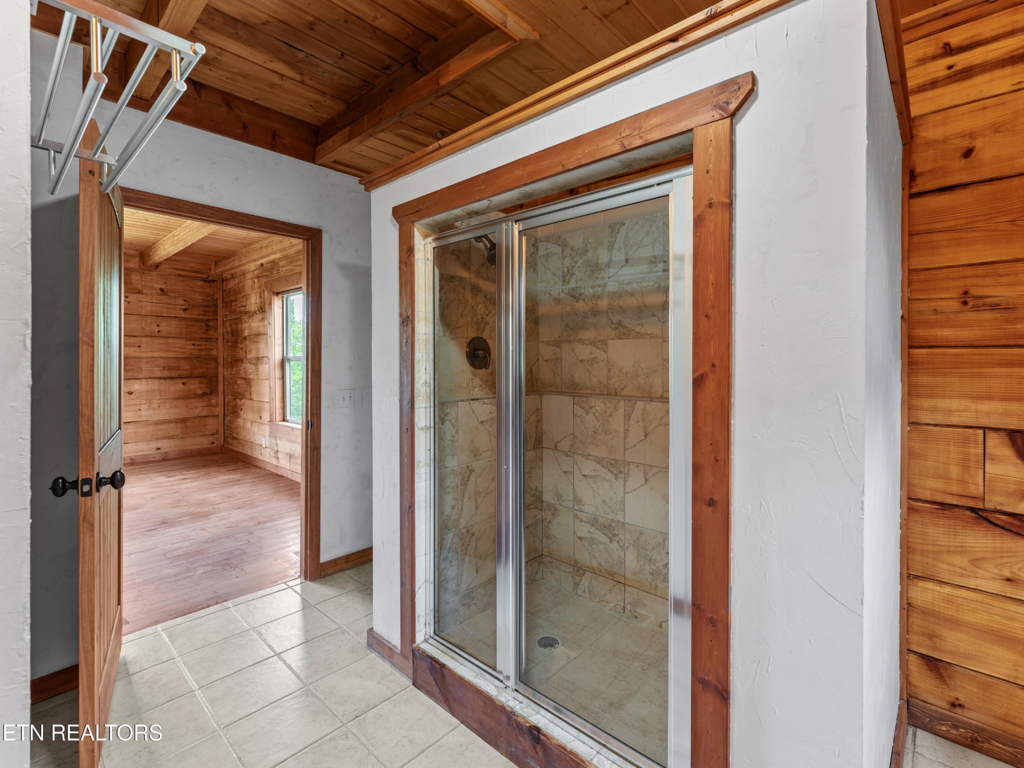 155 George Thomas Road Vonore, TN 37885 - Photo 27 of 51 a view of a bathroom with a glass door