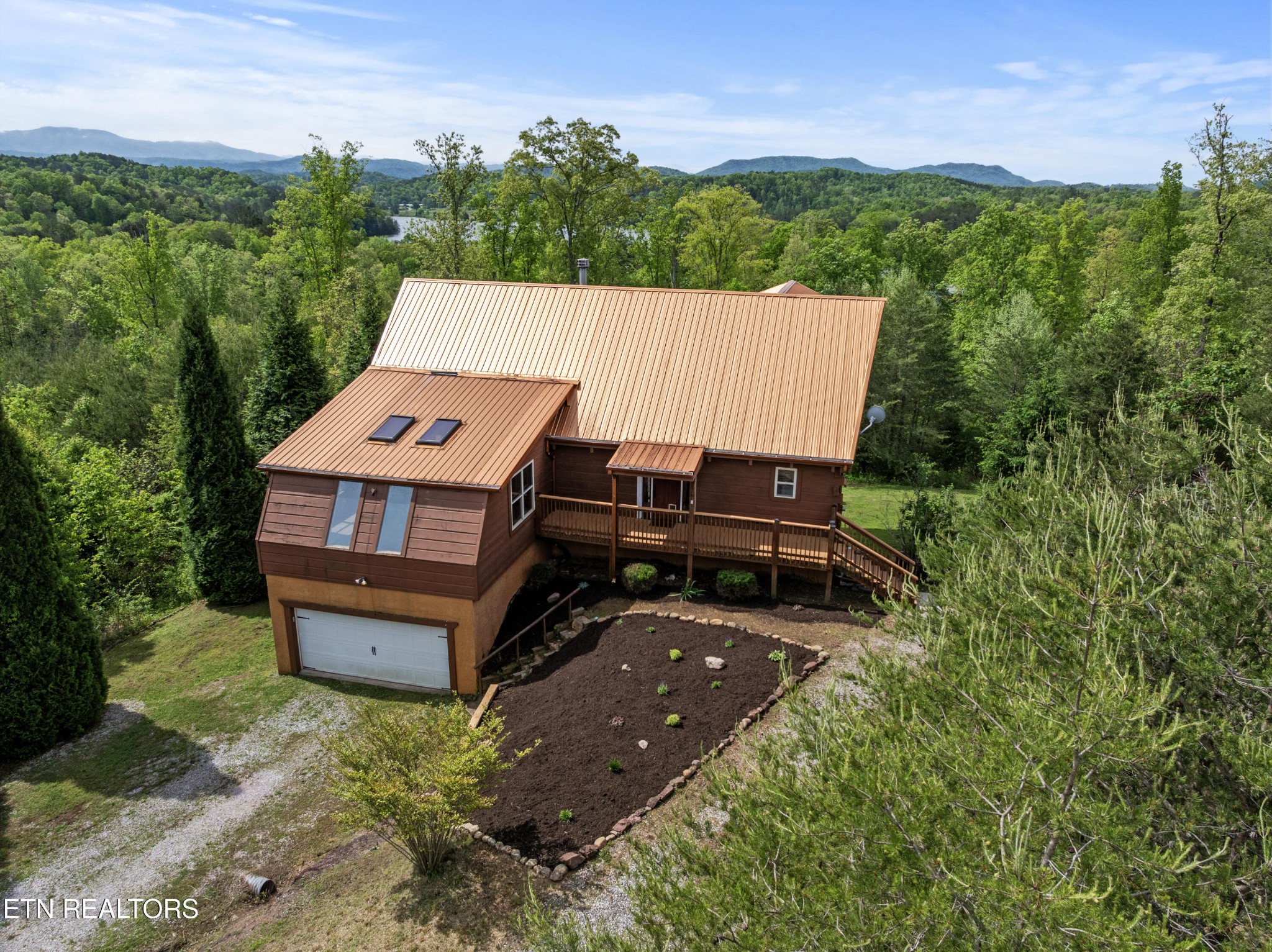 155 George Thomas Road Vonore, TN 37885 - Photo 4 of 51 an aerial view of a house with balcony and outdoor space