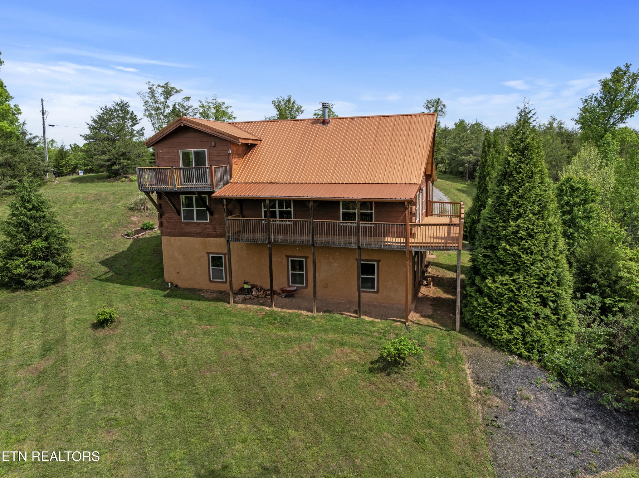 155 George Thomas Road Vonore, TN 37885 - Photo 50 of 51 front view of a house with a yard