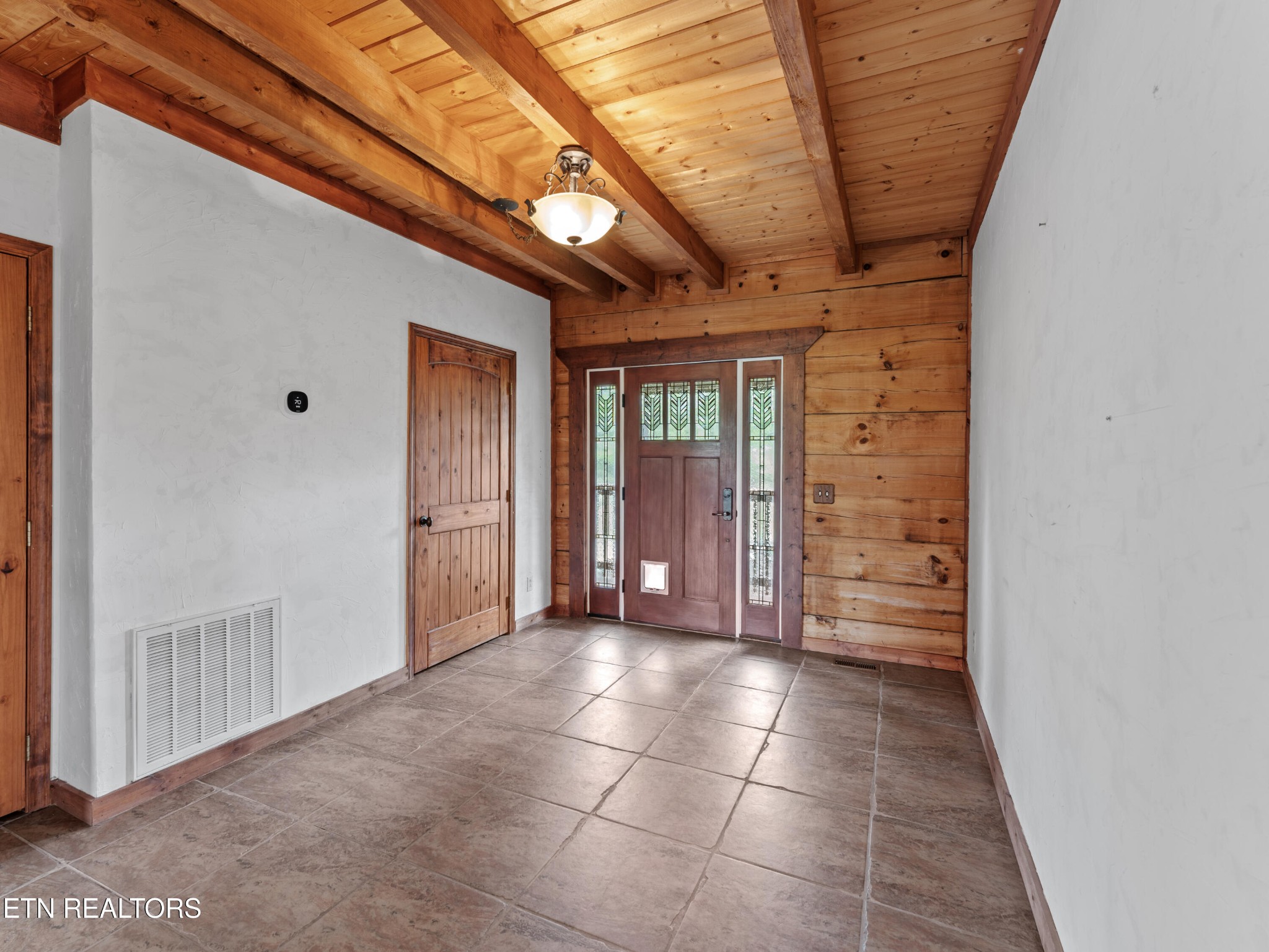 155 George Thomas Road Vonore, TN 37885 - Photo 8 of 51 a view of a hallway with wooden shelves