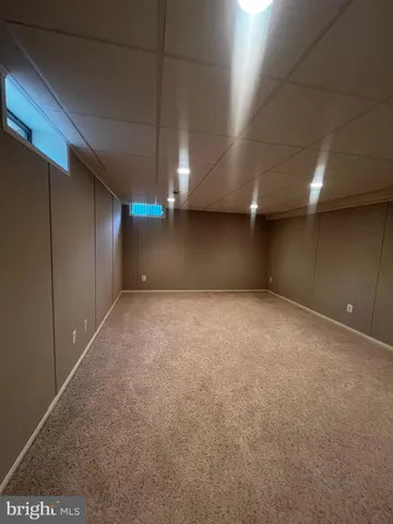 a view of a house with a back yard