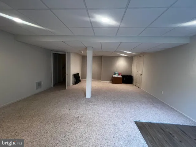 a view of a livingroom with a staircase