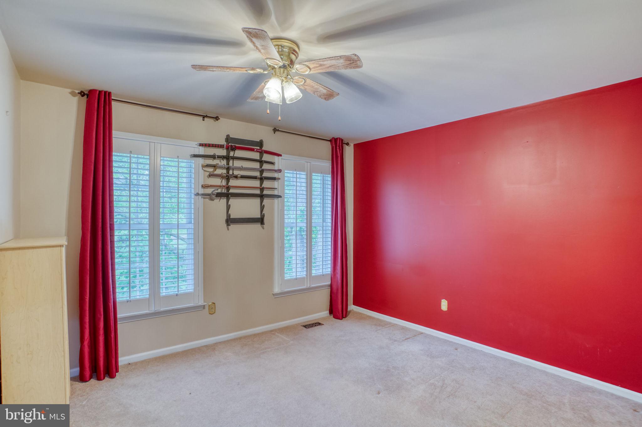 357 Willits Way Garnet Valley, PA 19060 - Photo 39 of 63 an empty room with chandelier fan and windows