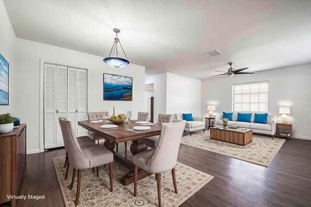 a dining room with furniture window wooden floor