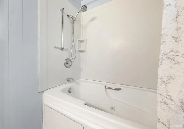 a bathroom with a bathtub