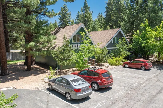 a car parked in front of a house