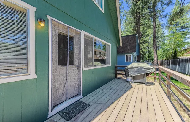 an aerial view of a house with outdoor space