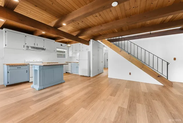 a view of kitchen with wooden floor