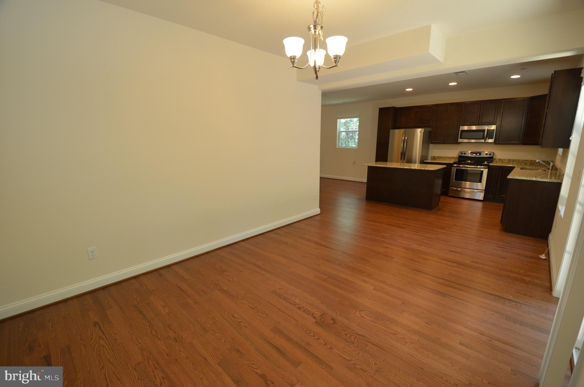 5917 Sneed Drive Deale, MD 20751 - Photo 11 of 26 a view of a kitchen with a sink and cabinet