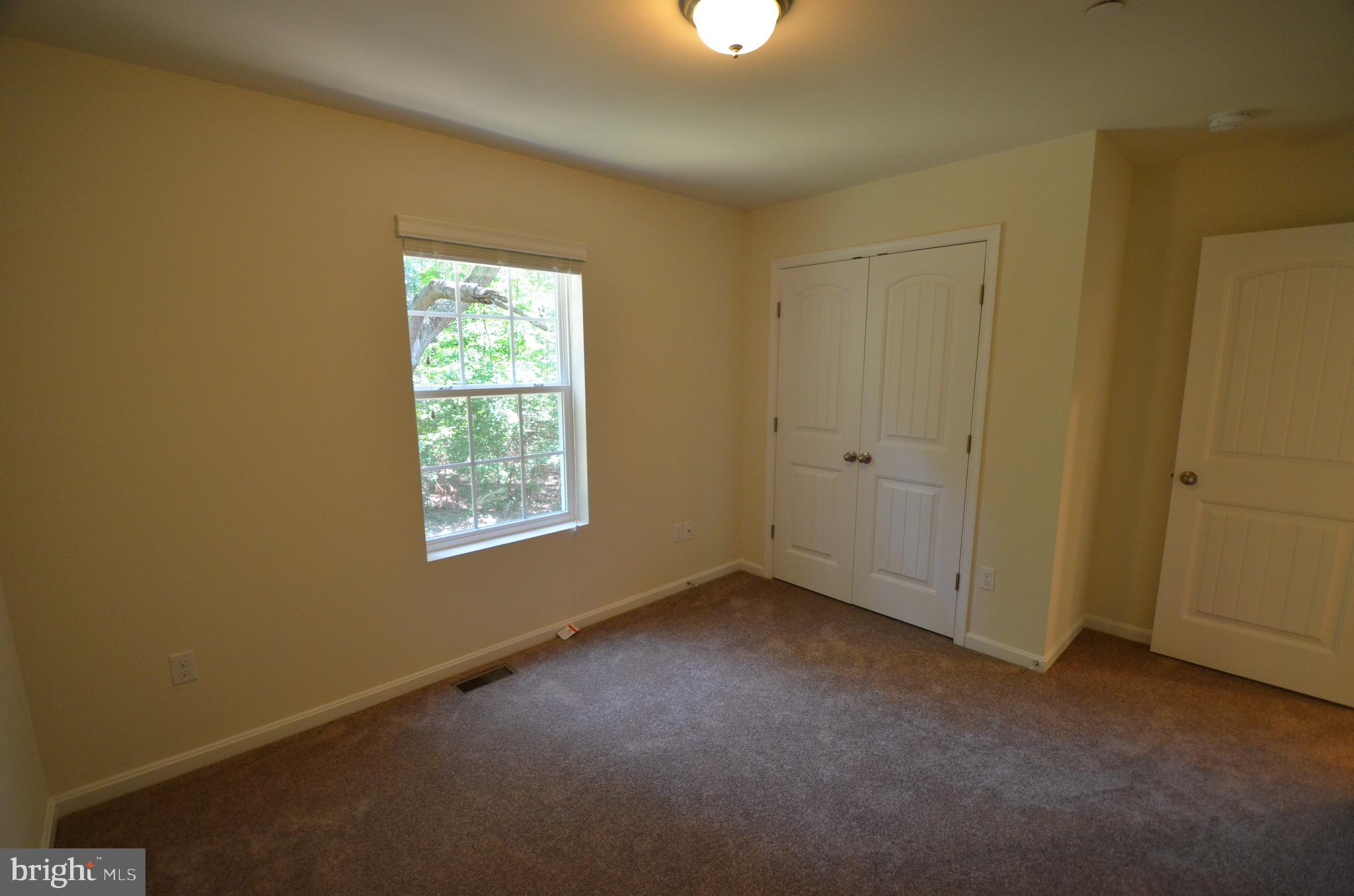 5917 Sneed Drive Deale, MD 20751 - Photo 17 of 26 a view of an empty room with a window