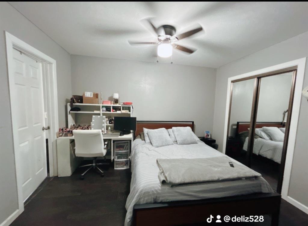 715 West Monterey Street Denison, TX 75020 - Photo 7 of 9 a bedroom with a bed and furniture