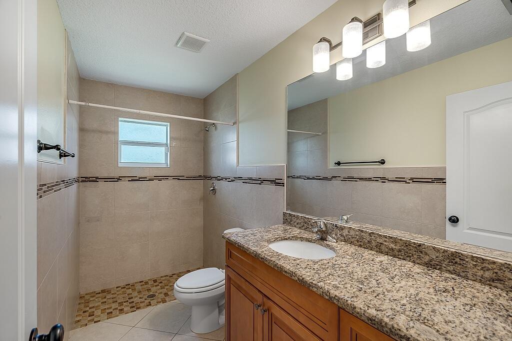 2942 Southeast Bella Road Port St. Lucie, FL 34984 - Photo 19 of 25 2942-SE-Bella-Rd-036-1024