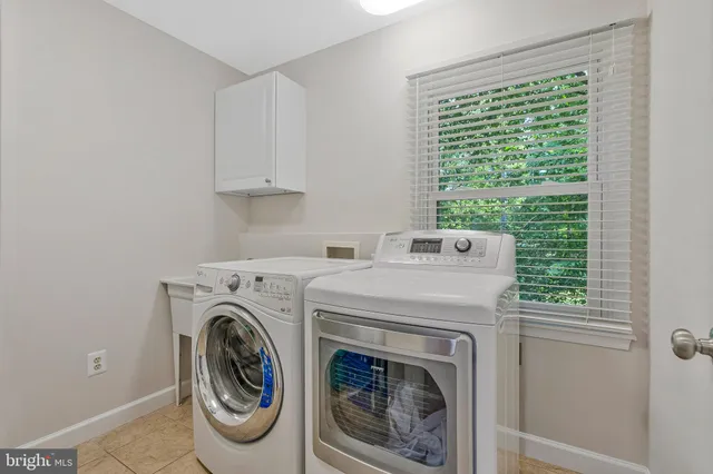 a bathroom with a shower and a toilet