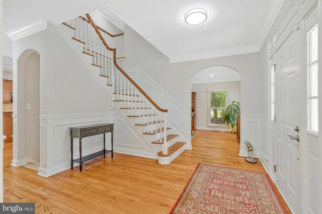 a work room with furniture and wooden floor