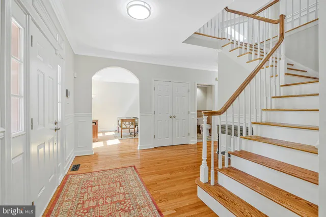 a view of a dining room with furniture and a window