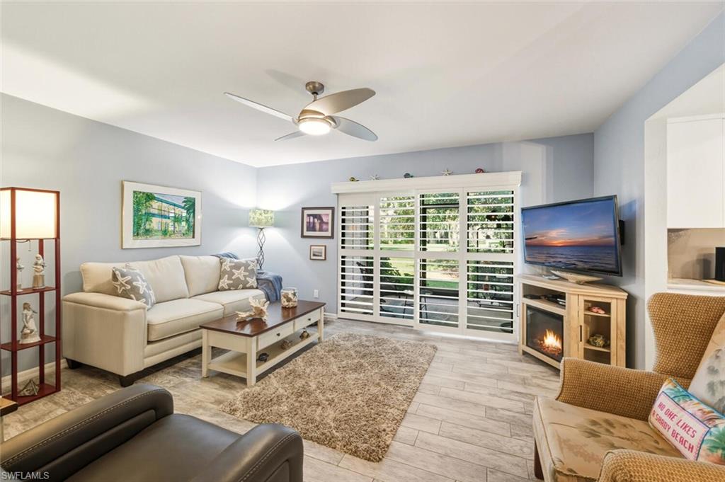 7380 St Ives Way, Unit 1108 Naples, FL 34104 - Photo 5 of 46 LIVING ROOM BEAUTIFUL TILE FLOOR