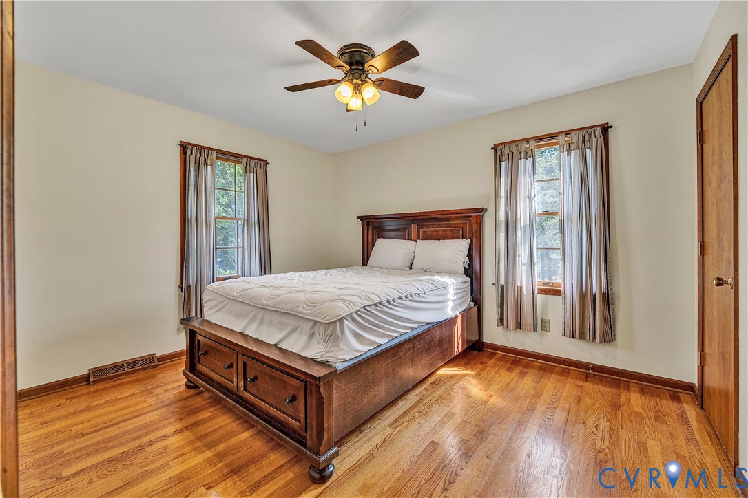 258 Willow Oak Road Appomattox, VA 24522 - Photo 23 of 50 Hardwood flooring throughout, ceiling fan, and two