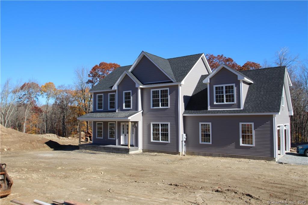 384 Bozrah Street Bozrah, CT 06334 - Photo 1 of 14 a front view of a house with a yard