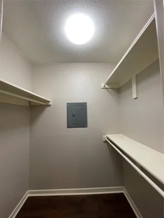a view of a hallway with closet