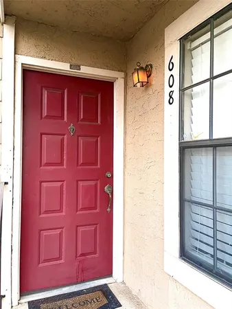 a view of a red door of the house
