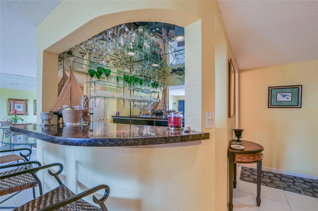 3930 Inverrary Boulevard, Unit 608D Lauderhill, FL 33319 - Photo 12 of 65 a view of a dining room with furniture window and outside view