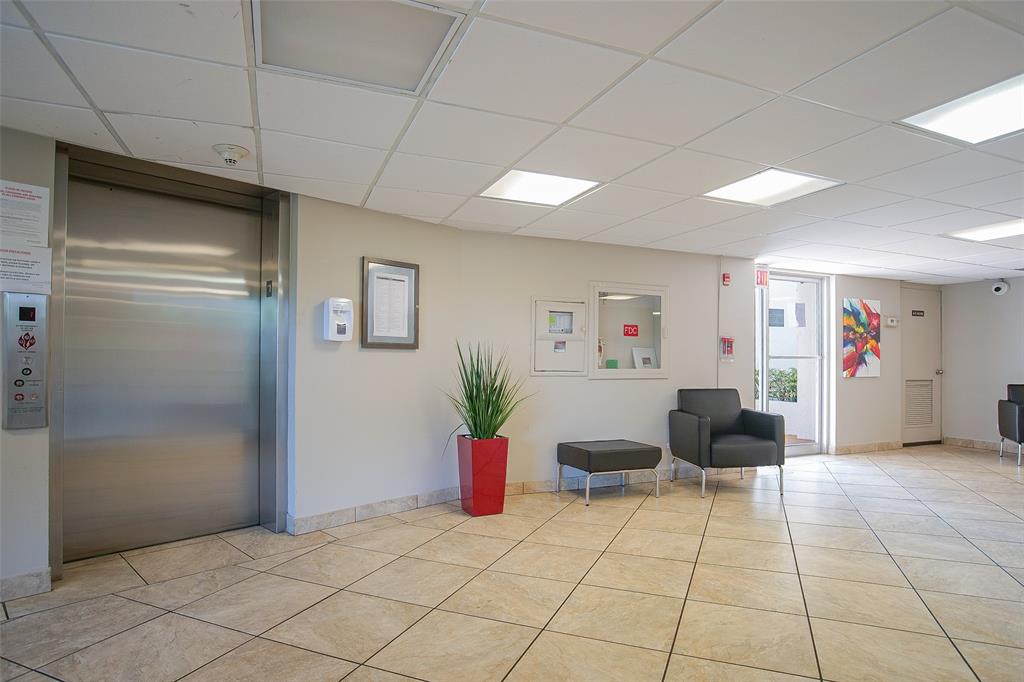 3930 Inverrary Boulevard, Unit 608D Lauderhill, FL 33319 - Photo 42 of 65 a living room with furniture