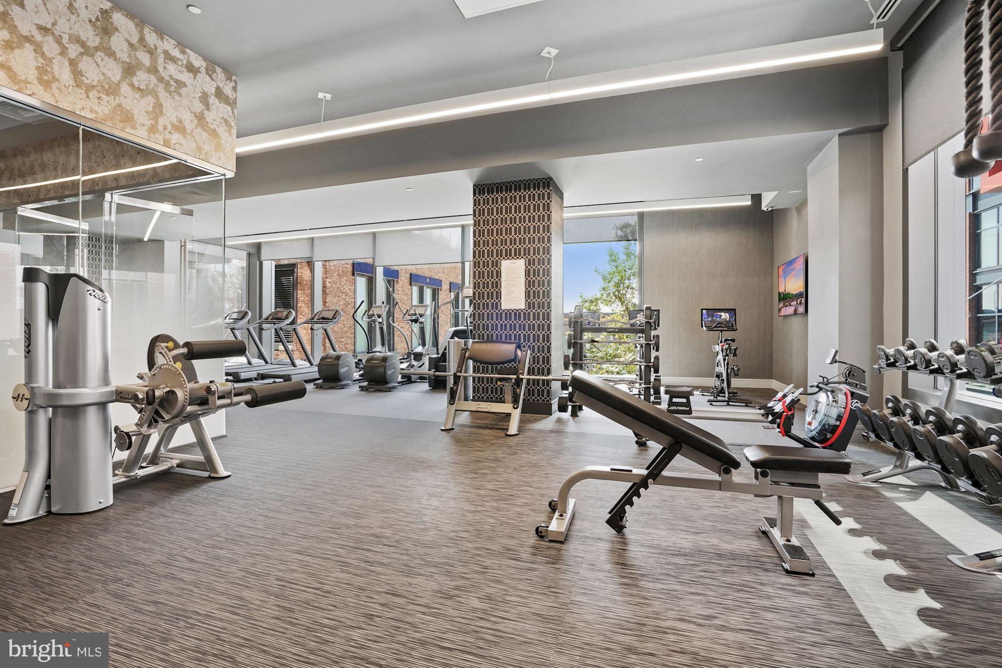 45 Sutton Square Southwest, Unit 1112 Washington, DC 20024 - Photo 37 of 46 Modern fitness space with abundant natural light.
