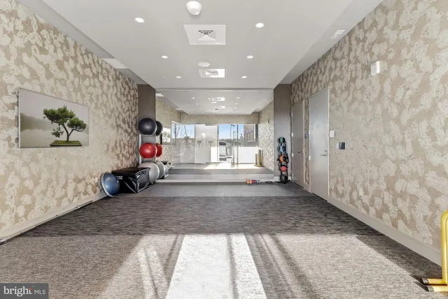 a view of a terrace with sitting area