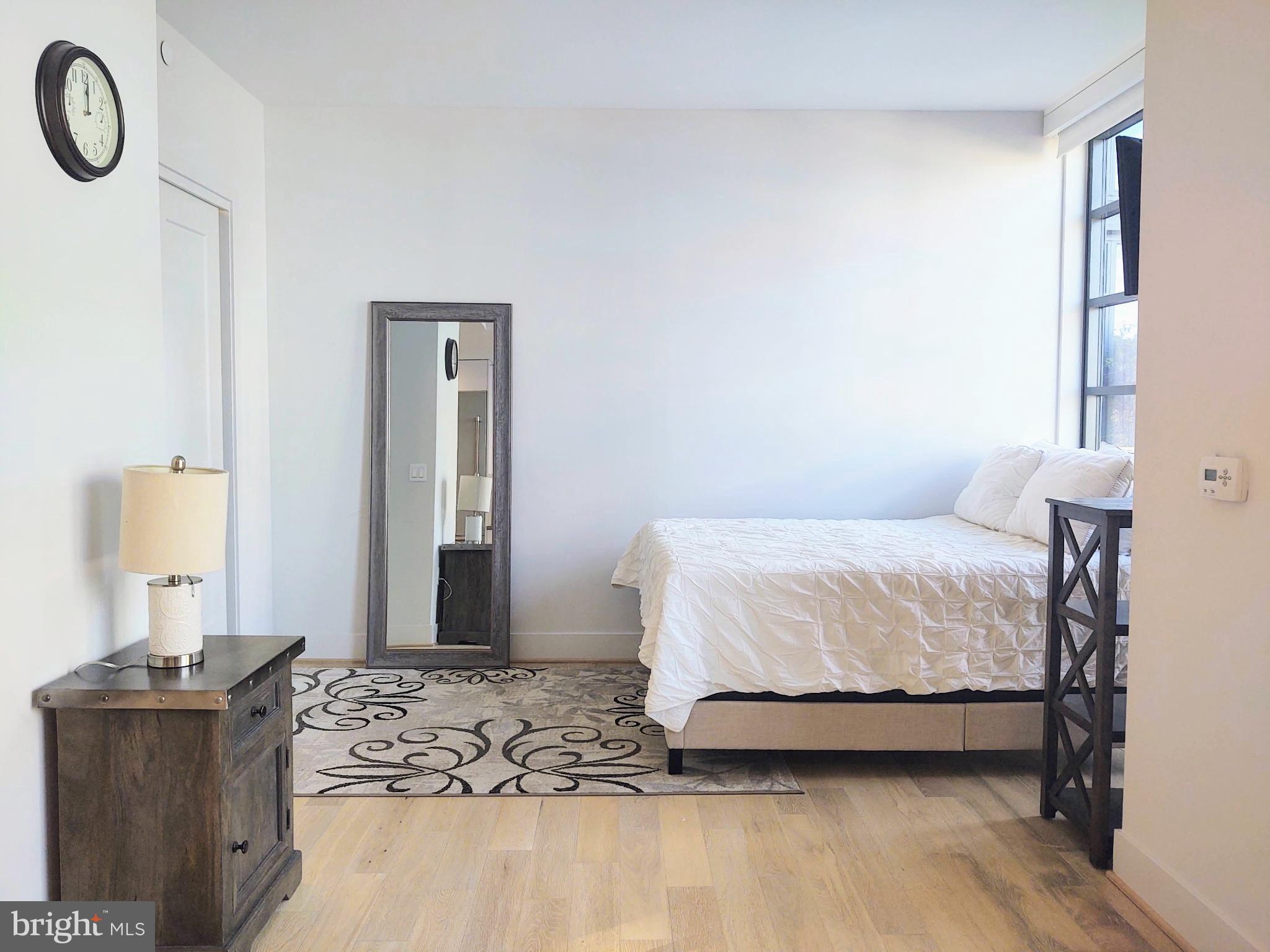 45 Sutton Square Southwest, Unit 1112 Washington, DC 20024 - Photo 10 of 46 Bright and airy living & sleeping w/modern charm.