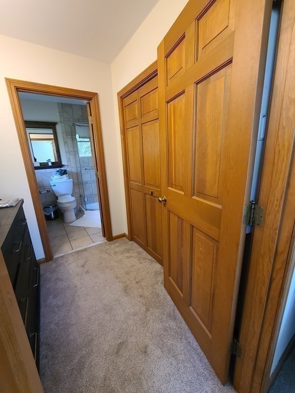 103 Burbank Road Sutton, MA 01590 - Photo 20 of 36 a view of a storage & utility room with closet