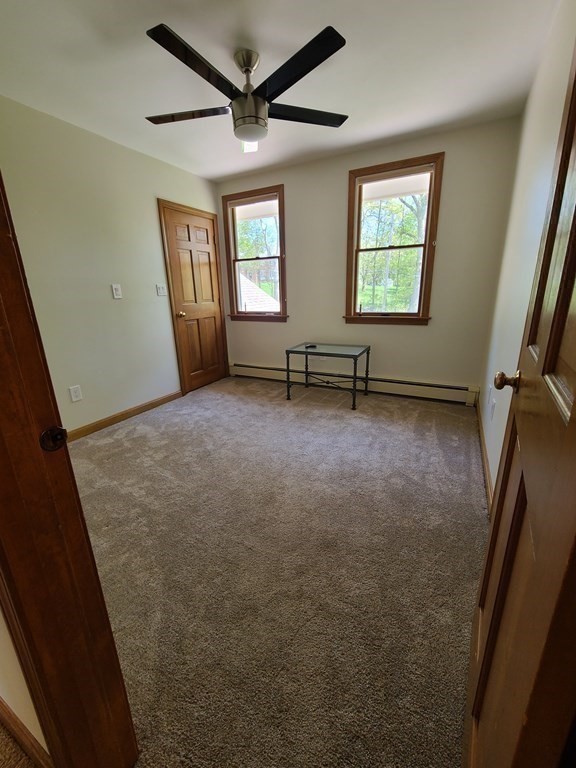 103 Burbank Road Sutton, MA 01590 - Photo 24 of 36 a view of empty room with windows
