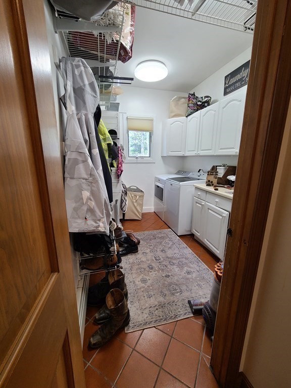103 Burbank Road Sutton, MA 01590 - Photo 28 of 36 a kitchen with a refrigerator and a stove