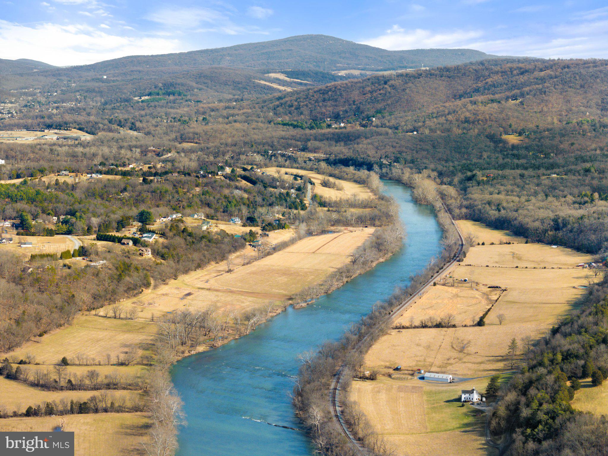 Lot 25 Sunset Village Road Front Royal, VA 22630 - Photo 1 of 5 a view of a lake in middle of the town