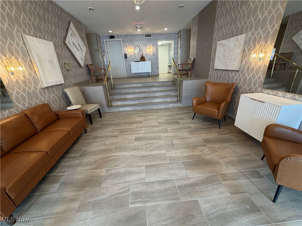 3066 Kent Road, Unit 407 Stow, OH 44224 - Photo 15 of 16 Community lobby featuring stairs and wallpapered walls