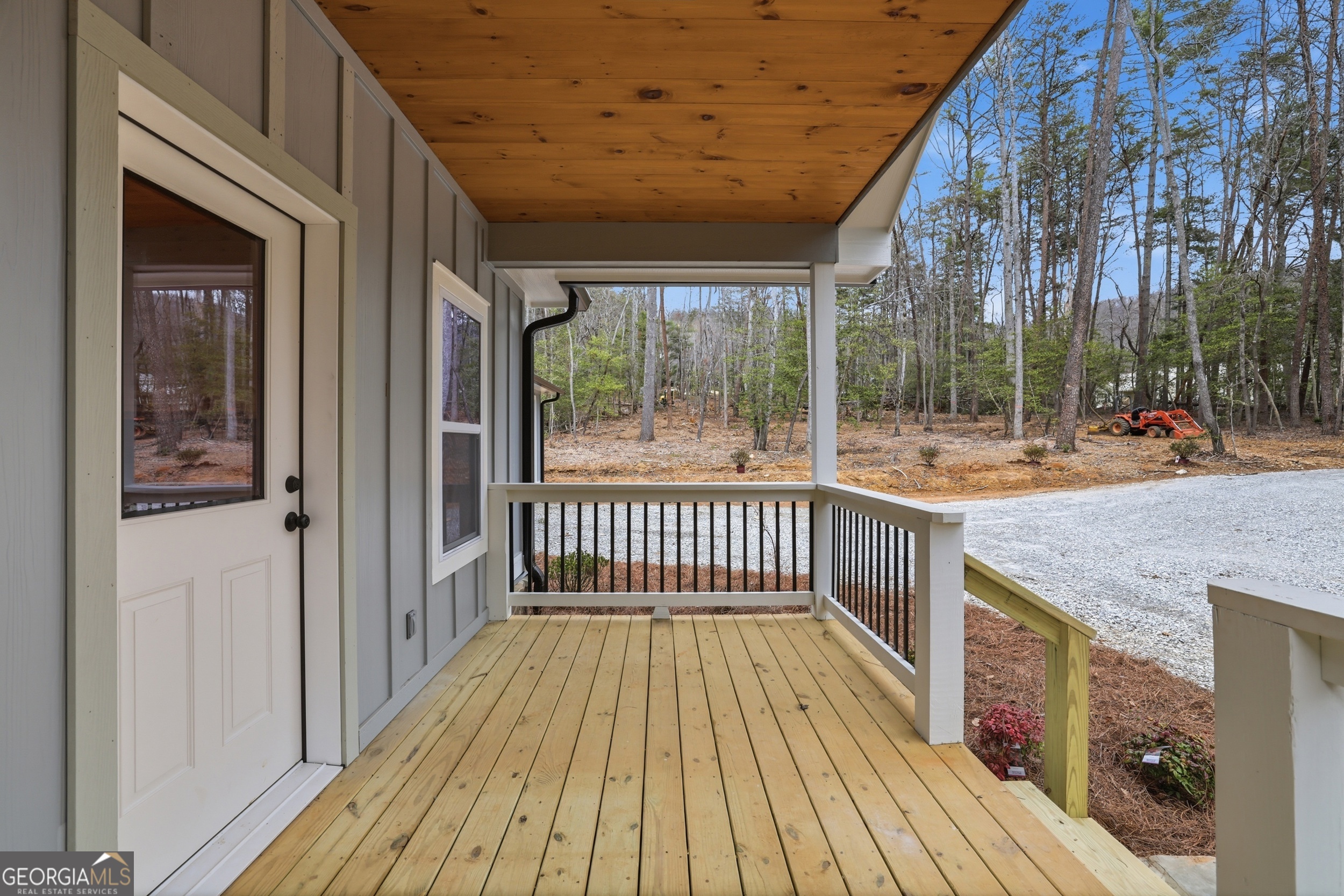 74 Blanche Place Road Clayton, GA 30525 - Photo 33 of 42 a view of a porch with wooden floor and outdoor space