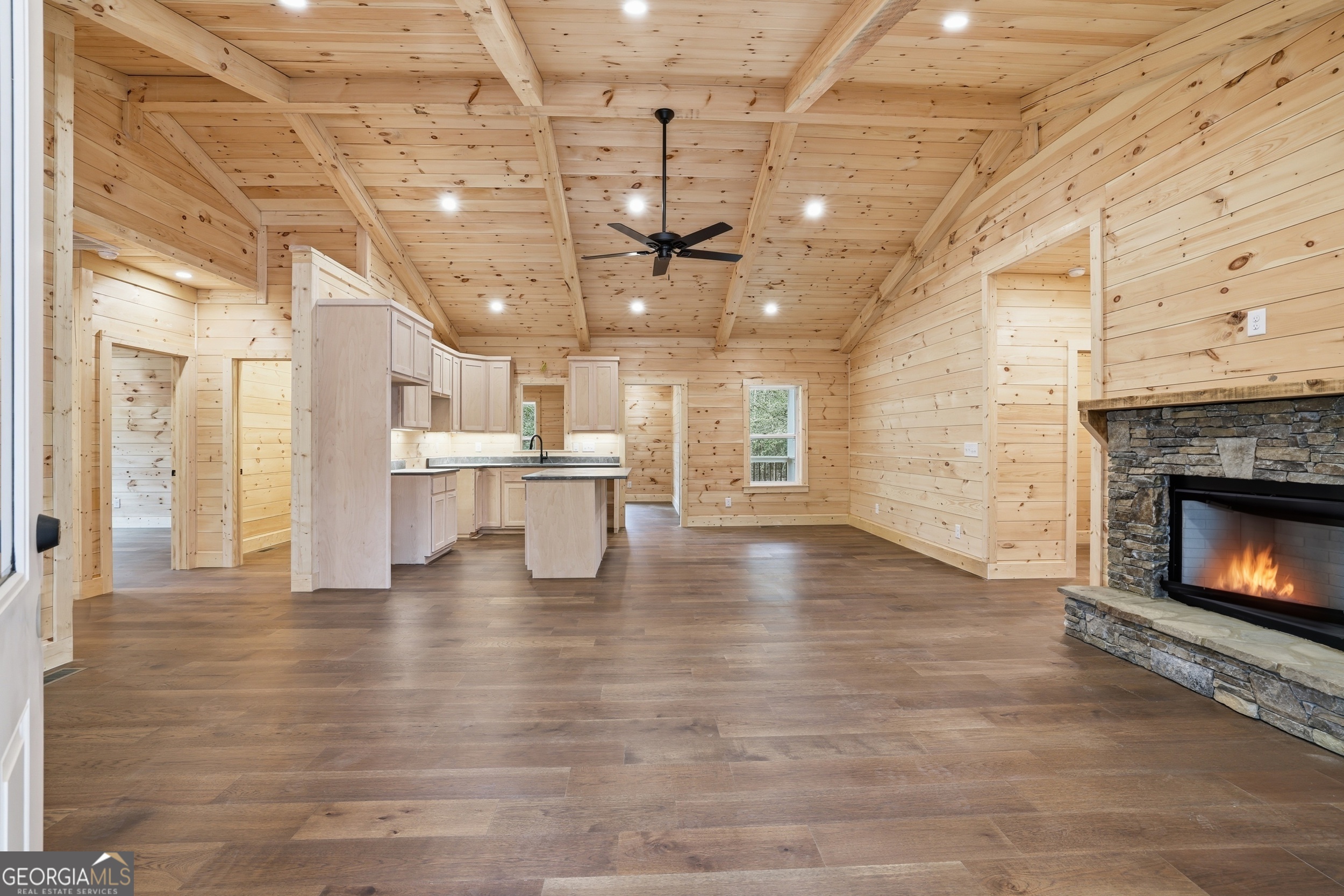 74 Blanche Place Road Clayton, GA 30525 - Photo 4 of 42 a view of a room with wooden floor and a fireplace