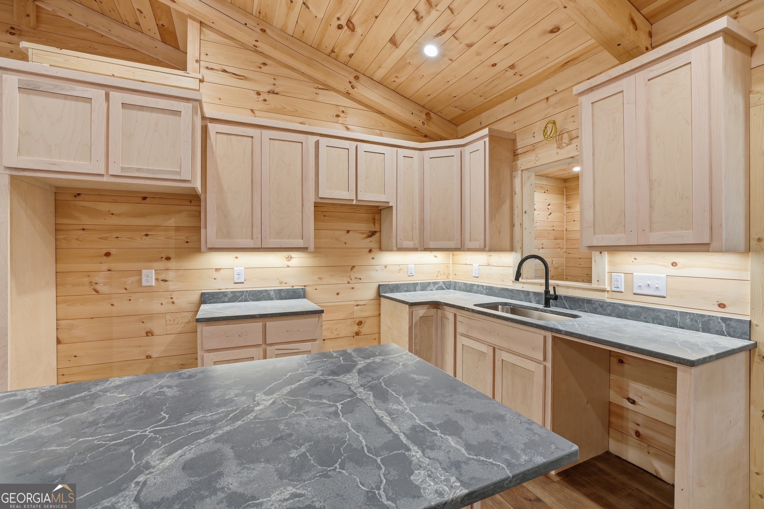 74 Blanche Place Road Clayton, GA 30525 - Photo 10 of 42 a kitchen with a sink stove and cabinets