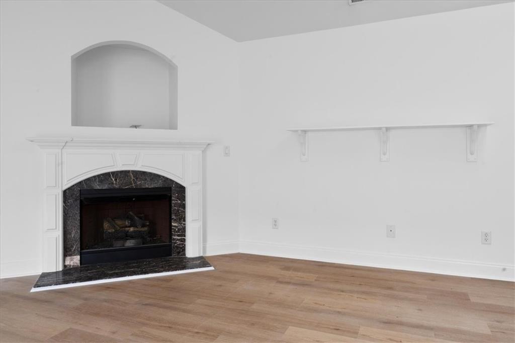 156 Cottage Club Drive Locust Grove, GA 30248 - Photo 13 of 34 a room with a fireplace