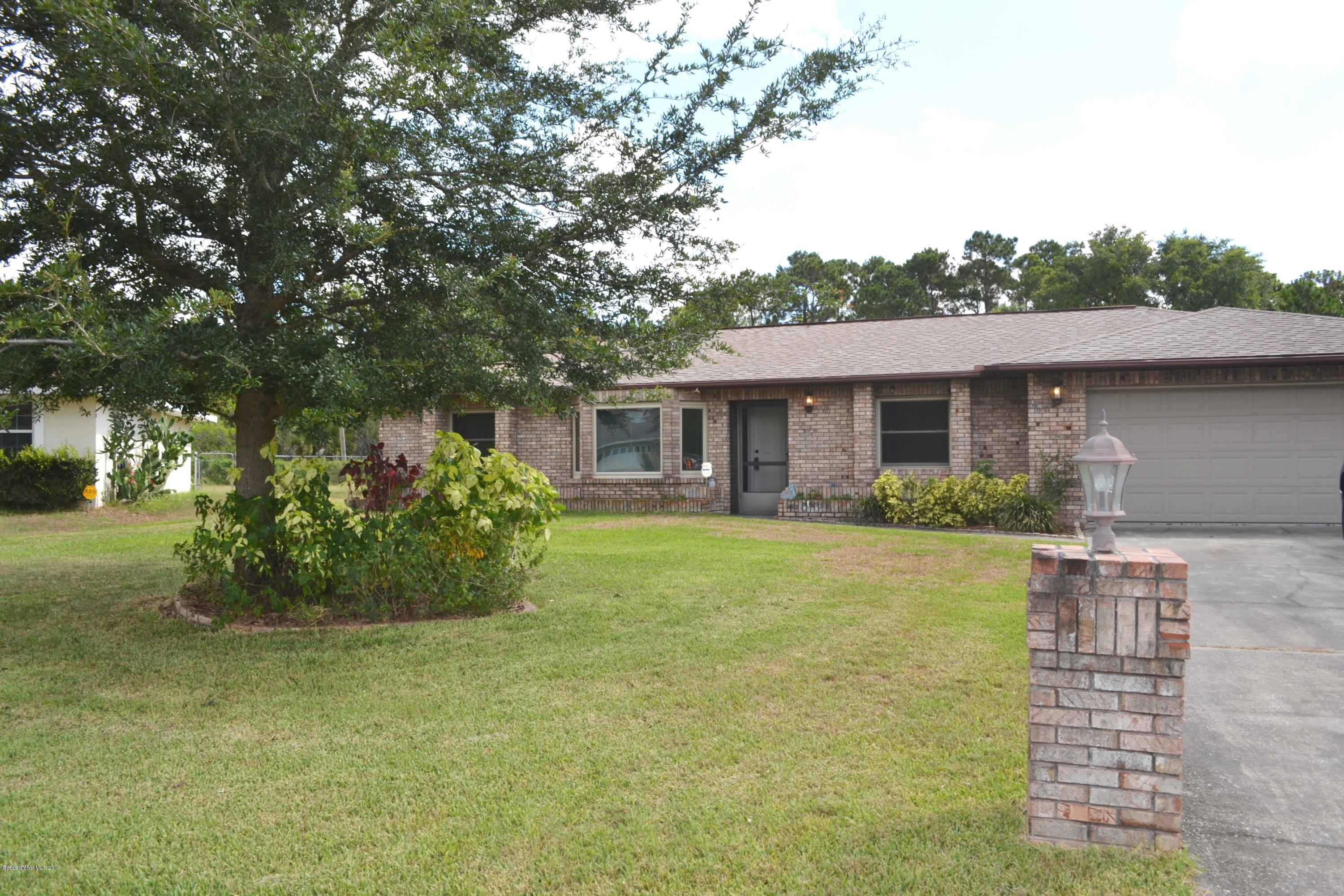701 Furth Road Northwest Palm Bay, FL 32907 - Photo 1 of 23 Front