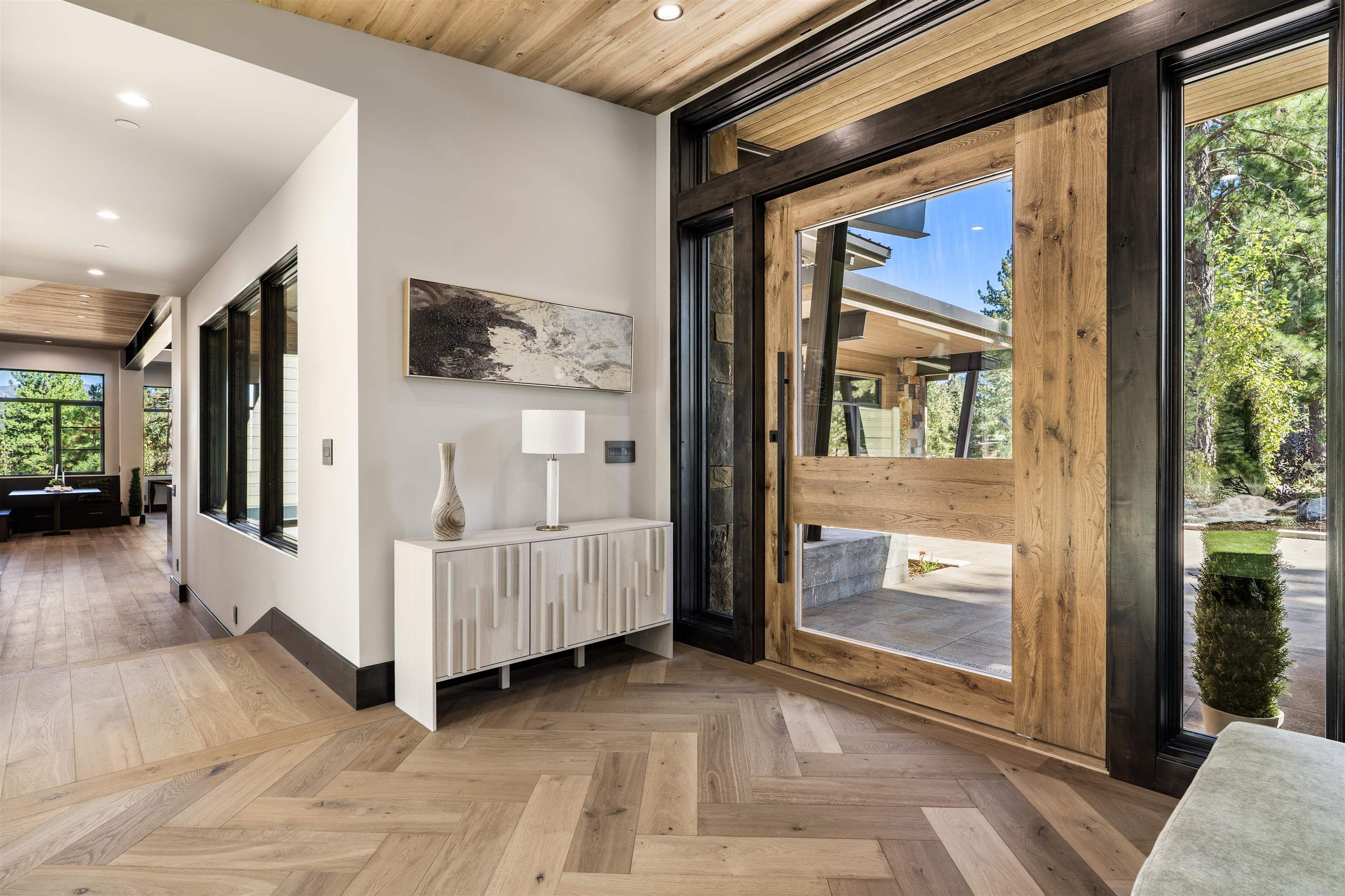 130 James Reed Truckee, CA 96161 - Photo 5 of 28 a view of a hallway with wooden floor and windows