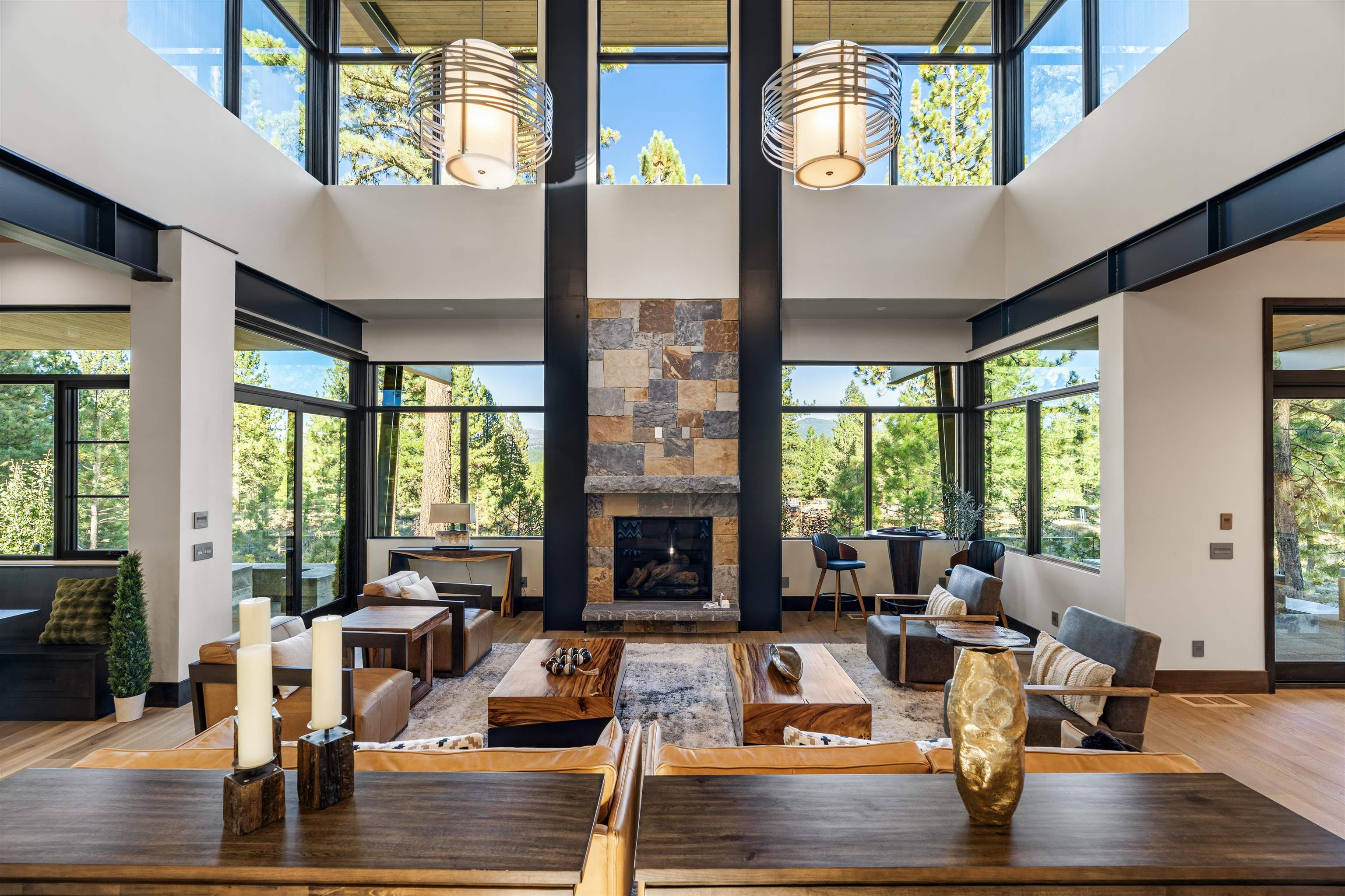 130 James Reed Truckee, CA 96161 - Photo 6 of 28 a living room with fireplace furniture large windows and wooden floor