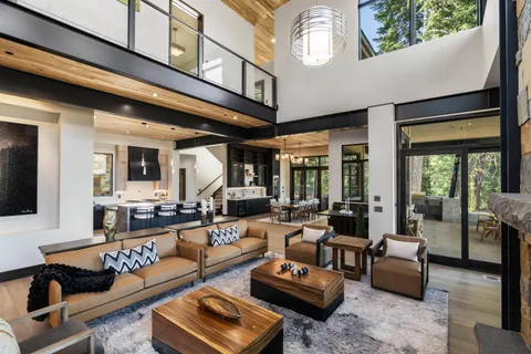 a living room with furniture or couch and a large window