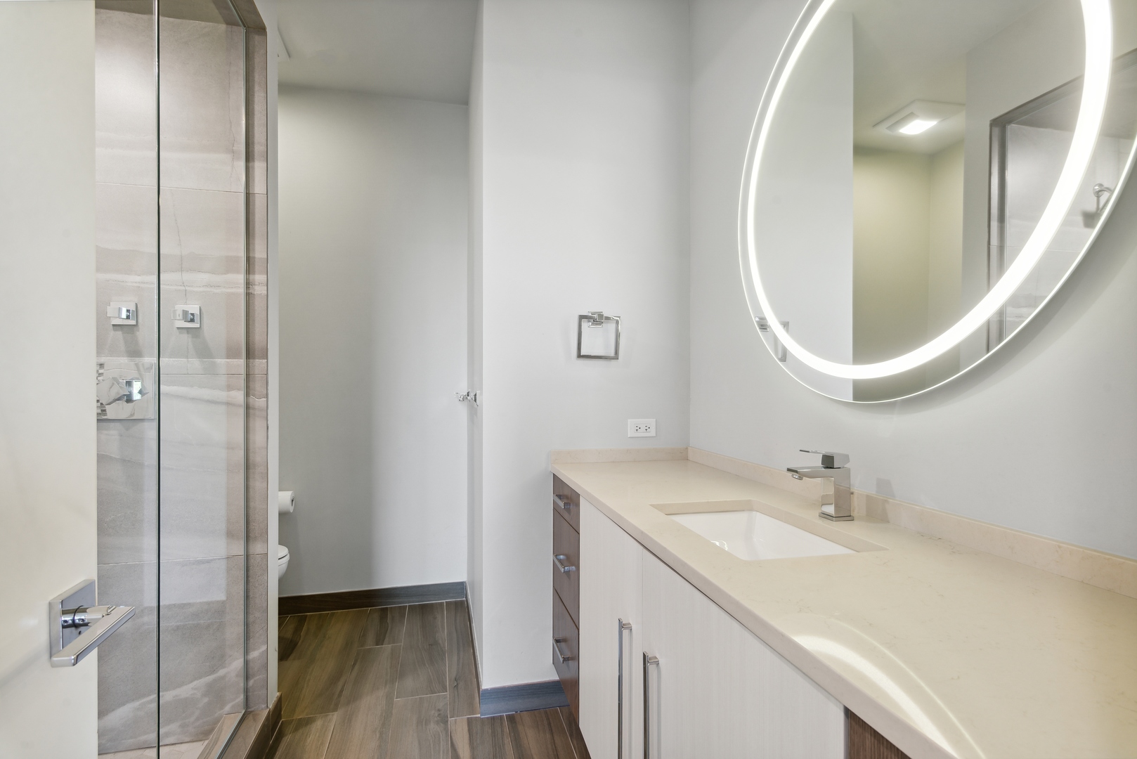 2352 West Winona Street, Unit 2W Chicago, IL 60625 - Photo 14 of 22 a bathroom with a sink and a mirror