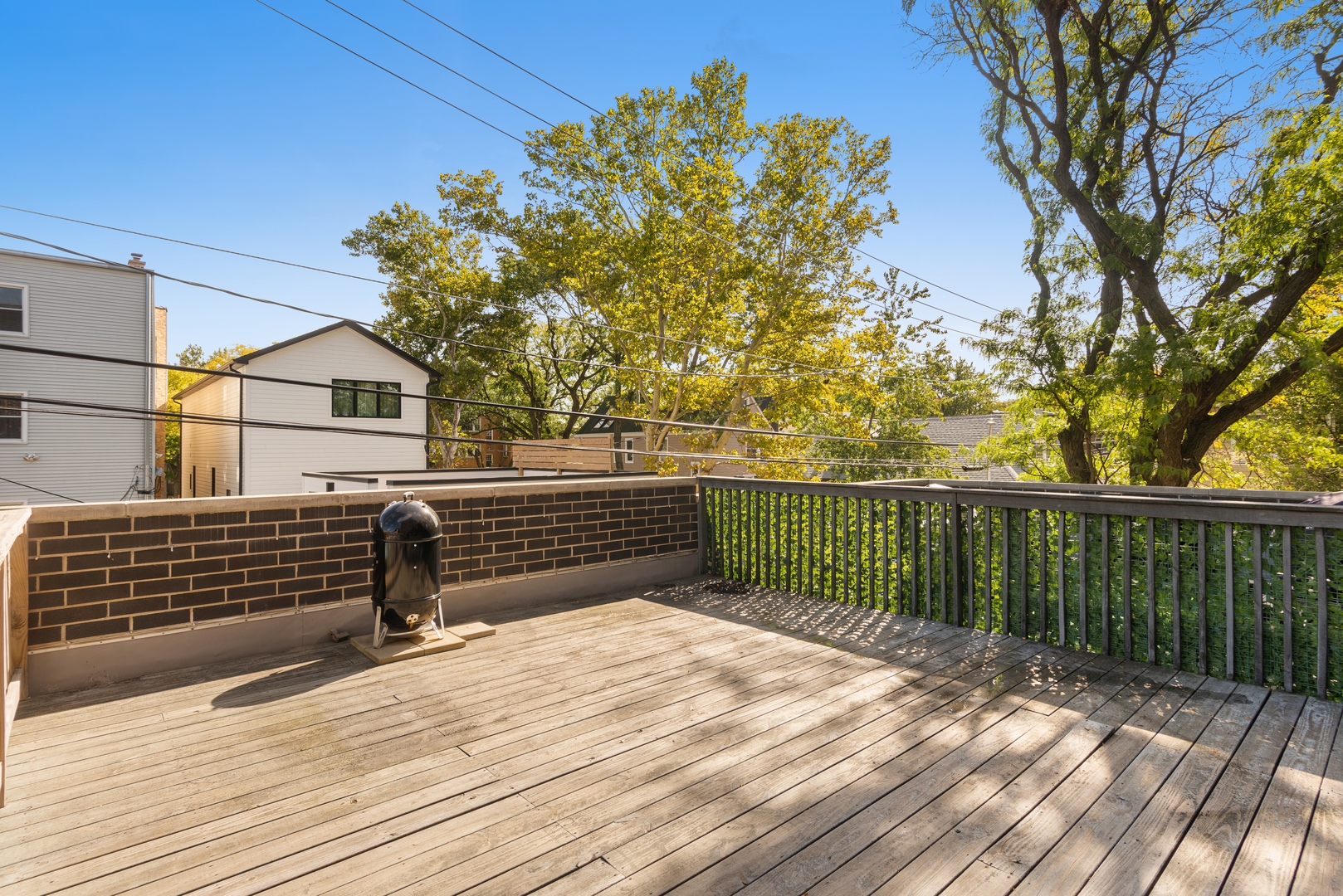 2352 West Winona Street, Unit 2W Chicago, IL 60625 - Photo 21 of 22 a balcony view with a garden