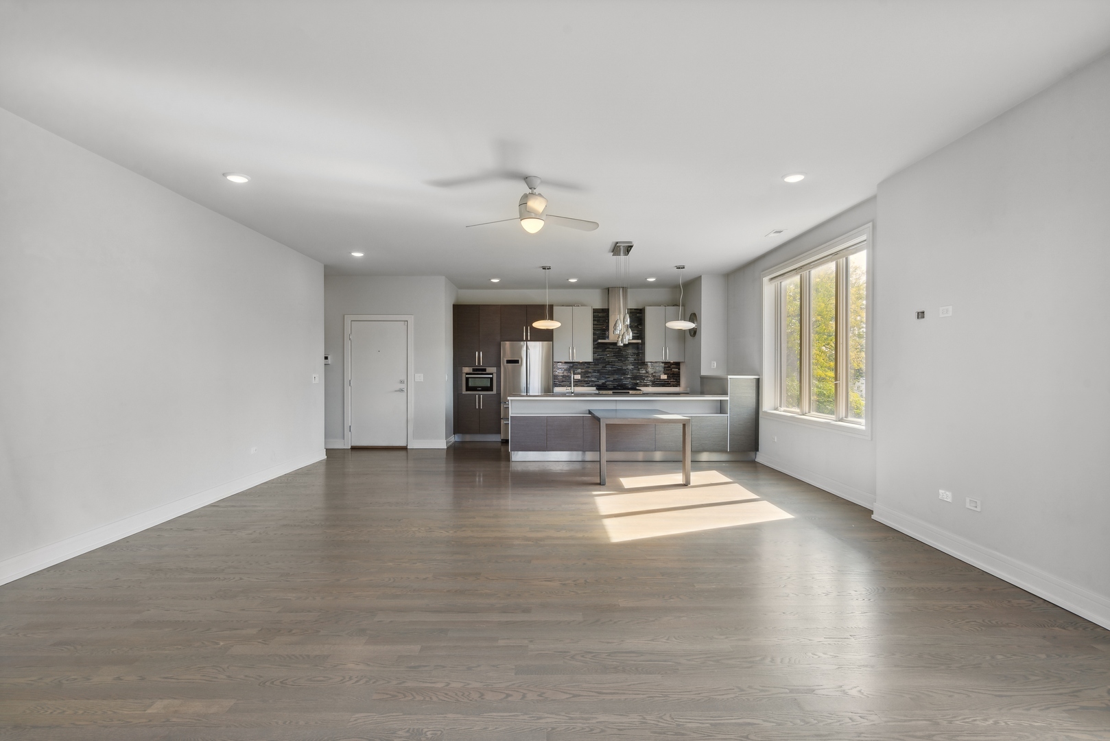 2352 West Winona Street, Unit 2W Chicago, IL 60625 - Photo 6 of 22 a view of kitchen with furniture and window